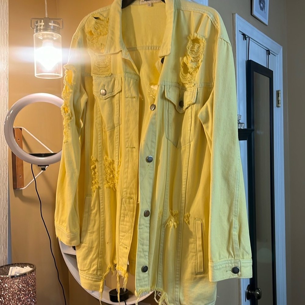 EUC distressed yellow jacket size lg.